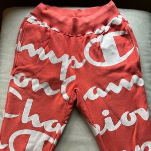 coral all-over champion logo sweatpants